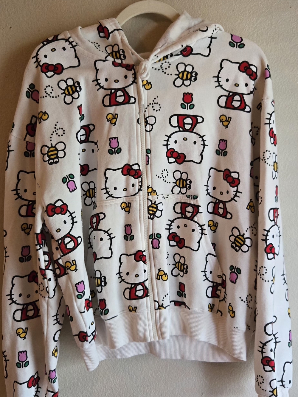 Hello Kitty White Zip Front Hoodie with Red Bow & Multicolor Prints